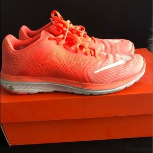 Gently worn neon orange Nike’s